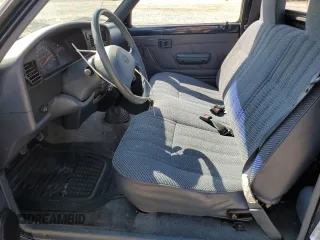 1994 Toyota Pickup with VIN 4TARN81A0RZ180129, listed as a Copart auction lot 51800195 with 153,538 mi miles and Salvage Title. Bid and sale history available at DreamBid. Image 7.