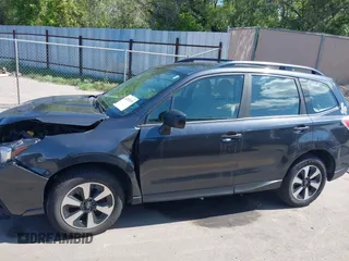 2018 Subaru Forester z VIN JF2SJABC1JH460419, wystawiony jako IAAI lot #42292895 z przebiegiem 141 486 mil mil oraz . Historia ofert i sprzedaży dostępna na DreamBid. Obrazek 14.