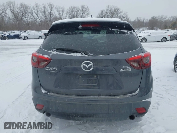 2016 Mazda CX-5 Grand Touring with VIN JM3KE4DY2G0913412, listed as a IAAI auction lot 41616132 with 85,166 mi miles. Bid and sale history available at carsss.com. Image 16.