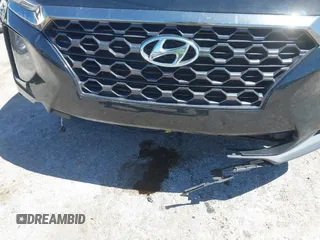 2019 Hyundai Santa Fe SEL with VIN 5NMS33AD4KH046114, listed as a IAAI auction lot 41826467 with 102,714 mi miles and . Bid and sale history available at DreamBid. Image 6.
