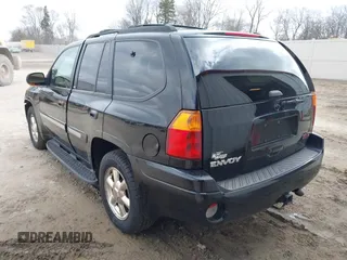 2002 GMC Envoy SLT with VIN 1GKDT13S622506181, listed as a IAAI auction lot 41986061 with 212,583 mi miles. Bid and sale history available at carsss.com. Image 3.