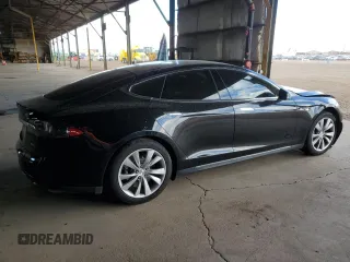 2014 Tesla Model S 60 z VIN 5YJSA1H11EFP36480, wystawiony jako Copart lot #71210254 z przebiegiem 121 014 mil mil oraz Szkoda całkowita • Salvage title. Historia ofert i sprzedaży dostępna na DreamBid. Obrazek 3.
