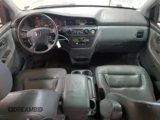 2004 Honda Odyssey EX-L z VIN 5FNRL18044B020316, wystawiony jako Copart lot #56027435 z przebiegiem 192 429 mil mil oraz Szkoda całkowita • Salvage title. Historia ofert i sprzedaży dostępna na DreamBid. Obrazek 8.