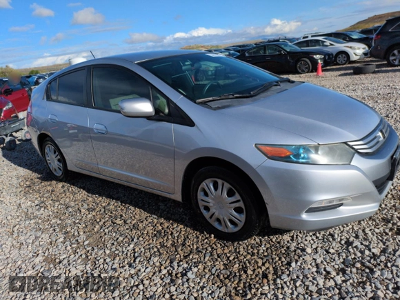2010 Honda Insight LX with VIN JHMZE2H51AS011243, listed as a Copart auction lot 54445555 with 224,722 mi miles and Salvage Title. Bid and sale history available at DreamBid. Image 4.