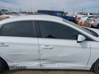 2015 Hyundai Sonata SE z VIN 5NPE24AFXFH235205, wystawiony jako IAAI lot #41596454 z przebiegiem 66 461 mil mil oraz . Historia ofert i sprzedaży dostępna na DreamBid. Obrazek 13.