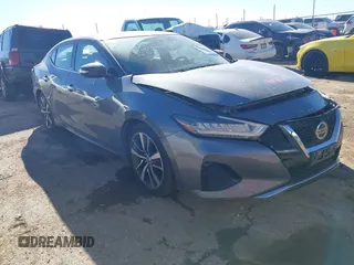 2019 Nissan Maxima Platinum z VIN 1N4AA6AV6KC383108, wystawiony jako IAAI lot #41286758 z przebiegiem 47 198 mil mil oraz . Historia ofert i sprzedaży dostępna na DreamBid. Obrazek 1.