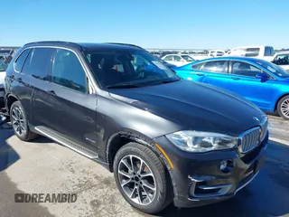 2015 BMW X5 sDrive35i with VIN 5UXKR2C59F0H37452, listed as a IAAI auction lot 40912358 with 101,569 mi miles. Bid and sale history available at carsss.com. Image 1.