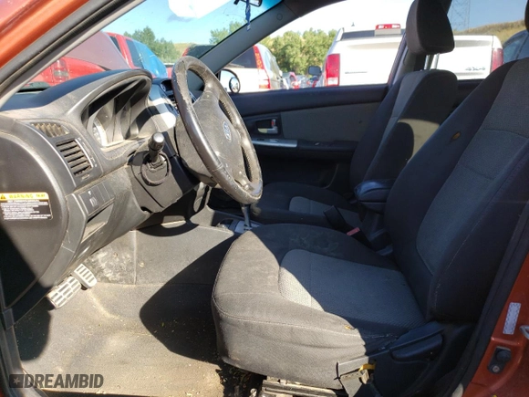 2007 Kia Spectra with VIN KNAFE162X75009714, listed as a Copart auction lot 69094894 with 206,173 mi miles and Salvage Title. Bid and sale history available at carsss.com. Image 7.