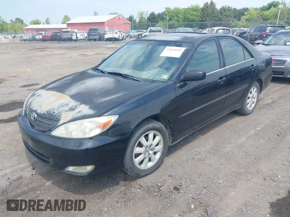 2003 Toyota Camry LE with VIN 4T1BE30K33U243758, listed as a IAAI auction lot 42169032 with 260,336 mi miles and . Bid and sale history available at DreamBid. Image 2.