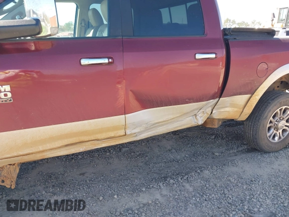 2017 Ram 2500 Laramie z VIN 3C6UR5FL6HG693953, wystawiony jako IAAI lot #41849571 z przebiegiem 99 754 mil mil oraz . Historia ofert i sprzedaży dostępna na DreamBid. Obrazek 6.