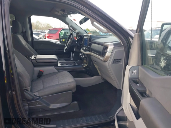 2021 Ford F-150 XL with VIN 1FTFW1CD4MFC76410, listed as a IAAI auction lot 41405983 with 79,768 mi miles and . Bid and sale history available at DreamBid. Image 5.