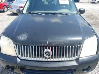 2003 Mercury Mountaineer Convenience z VIN 4M2DU86K43ZJ10878, wystawiony jako IAAI lot #42390874 z przebiegiem 194 867 mil mil oraz . Historia ofert i sprzedaży dostępna na DreamBid. Obrazek 6.