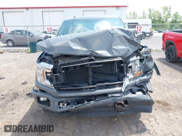 2018 Ford F-150 XL with VIN 1FTEW1EPXJFD25656, listed as a IAAI auction lot 42650683 with 119,326 mi miles and . Bid and sale history available at DreamBid. Image 12.