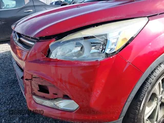 2014 Ford Escape SE with VIN 1FMCU9G90EUD71021, listed as a IAAI auction lot 42052487 with 154,811 mi miles and . Bid and sale history available at DreamBid. Image 6.