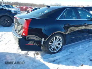 2013 Cadillac CTS Premium z VIN 1G6DS5E34D0160676, wystawiony jako IAAI lot #41262795 z przebiegiem 122 248 mil mil oraz . Historia ofert i sprzedaży dostępna na DreamBid. Obrazek 6.