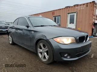 2013 BMW 1 Series 128i with VIN WBAUP7C59DVP24160, listed as a Copart auction lot 84736514 with 91,820 mi miles and Salvage Title. Bid and sale history available at carsss.com. Image 4.