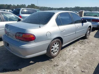1997 Chevrolet Malibu LS with VIN 1G1NE52M8VY107867, listed as a IAAI auction lot 41766004 with 165,647 mi miles. Bid and sale history available at carsss.com. Image 4.