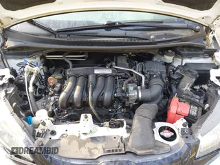 2015 Honda Fit LX with VIN 3HGGK5H50FM772396, listed as a IAAI auction lot 42112723 with 125,419 mi miles and . Bid and sale history available at carsss.com. Image 10.