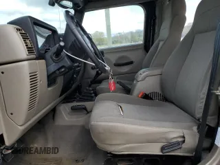 2003 Jeep Wrangler Sahara with VIN 1J4FA59S13P312830, listed as a Copart auction lot 52730955 with 99,247 mi miles and Salvage title. Bid and sale history available at DreamBid. Image 7.