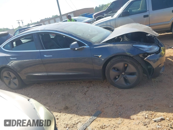 2019 Tesla Model 3 Long Range with VIN 5YJ3E1EB2KF510398, listed as a IAAI auction lot 42067654 with 108,971 mi miles and . Bid and sale history available at DreamBid. Image 12.