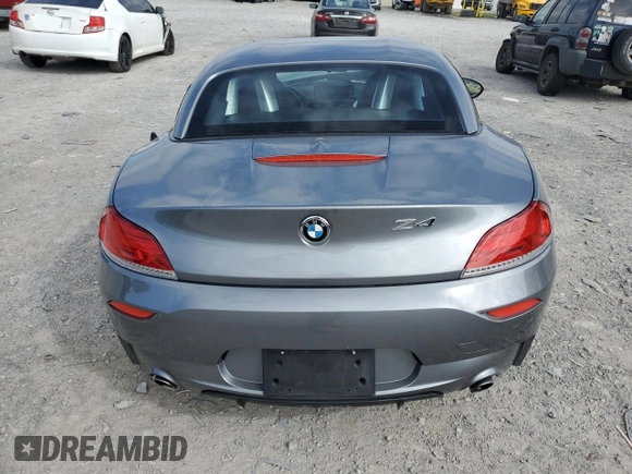 2011 BMW Z4 sDrive35is with VIN WBALM1C50BE633213, listed as a Copart auction lot 61220135 with 62,458 mi miles and Salvage title. Bid and sale history available at DreamBid. Image 6.