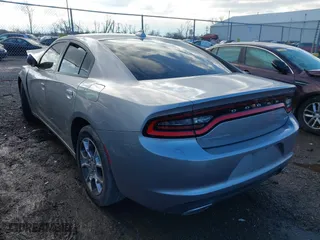 2016 Dodge Charger SXT with VIN 2C3CDXJG5GH328451, listed as a IAAI auction lot 41795674 with 88,965 mi miles. Bid and sale history available at carsss.com. Image 3.