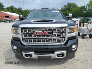 2019 GMC Sierra 3500HD Denali z VIN 1GT42WEY6KF240456, wystawiony jako Copart lot #58896115 z przebiegiem 67 144 mil mil oraz Czysty tytuł • Clean title. Historia ofert i sprzedaży dostępna na DreamBid. Obrazek 5.