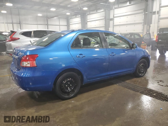 2009 Toyota Yaris with VIN JTDBT903991315725, listed as a Copart auction lot 52566735 with 177,044 mi miles and Salvage Title. Bid and sale history available at DreamBid. Image 3.