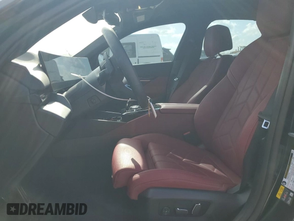 2024 BMW i5 eDrive40 with VIN WBY33FK09RCR50159, listed as a Copart auction lot 55520615 with 12,564 mi miles and Salvage title. Bid and sale history available at DreamBid. Image 7.