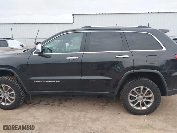 2015 Jeep Grand Cherokee Limited with VIN 1C4RJFBM9FC155161, listed as a IAAI auction lot 41590740 with 103,927 mi miles. Bid and sale history available at carsss.com. Image 15.