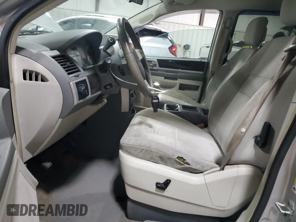 2010 Dodge Grand Caravan SXT with VIN 2D4RN5D1XAR268976, listed as a Copart auction lot 54587505 with 179,000 mi miles and Salvage Title. Bid and sale history available at DreamBid. Image 7.