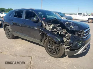 2022 Volkswagen Atlas SE with VIN 1V2WE2CA5NC200212, listed as a Copart auction lot 57658035 with 49,223 mi miles and Salvage title. Bid and sale history available at DreamBid. Image 4.