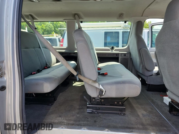 2011 Ford Econoline Passenger XL с VIN 1FBNE3BL2BDA25627, выставлен на аукционе Copart как лот 60203895 с пробегом 120 027 миль миль и Списание • Salvage title. История ставок и продаж доступна на DreamBid. Изображение 11.