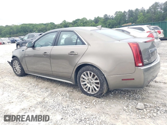 2011 Cadillac CTS with VIN 1G6DA5EYXB0137933, listed as a Copart auction lot 54679985 with 222,010 mi miles and Clean Title. Bid and sale history available at DreamBid. Image 2.