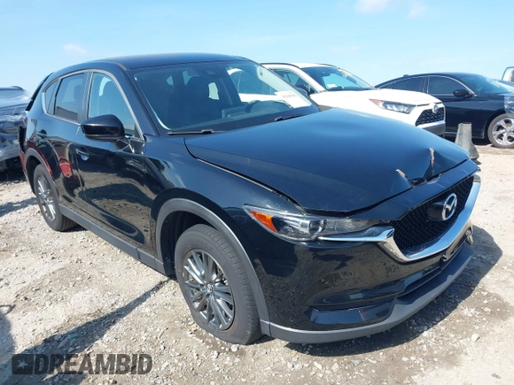 2017 Mazda CX-5 Touring z VIN JM3KFBCL0H0209458, wystawiony jako IAAI lot #42169599 z przebiegiem 93 287 mil mil oraz . Historia ofert i sprzedaży dostępna na DreamBid. Obrazek 1.
