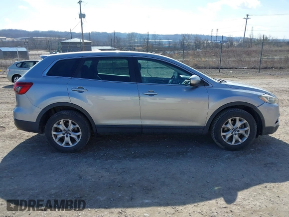 2015 Mazda CX-9 Sport with VIN JM3TB2BA6F0455539, listed as a IAAI auction lot 41839466 with 143,667 mi miles and . Bid and sale history available at carsss.com. Image 14.