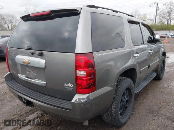 2007 Chevrolet Tahoe LT with VIN 1GNFC13077J278764, listed as a IAAI auction lot 41927809 with 211,943 mi miles and . Bid and sale history available at DreamBid. Image 4.