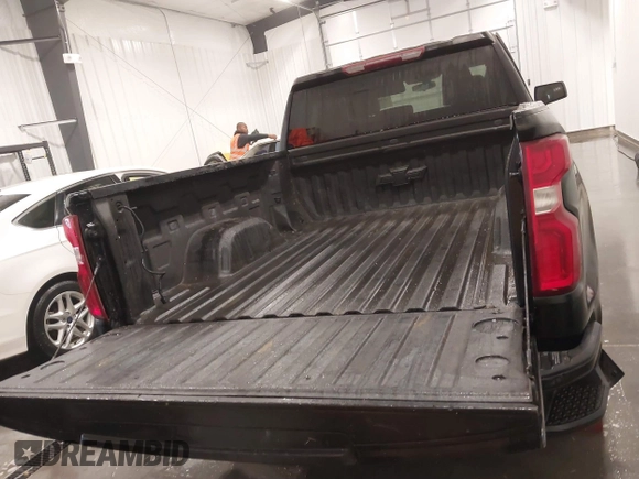2021 Chevrolet Silverado 1500 RST with VIN 1GCRYEEDXMZ135111, listed as a IAAI auction lot 41398152 with 54,051 mi miles and . Bid and sale history available at DreamBid. Image 18.