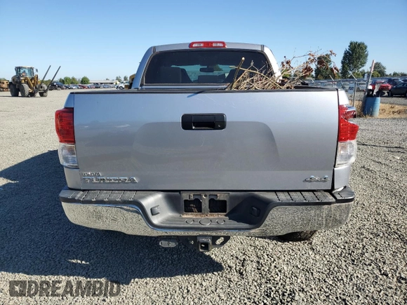 2012 Toyota Tundra 4WD Truck with VIN 5TFDM5F14CX035946, listed as a Copart auction lot 69534764 with 33,668 mi miles and Salvage Title. Bid and sale history available at carsss.com. Image 6.