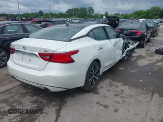 2018 Nissan Maxima SL with VIN 1N4AA6AP2JC395188, listed as a IAAI auction lot 42540832 with 106,898 mi miles and . Bid and sale history available at DreamBid. Image 4.