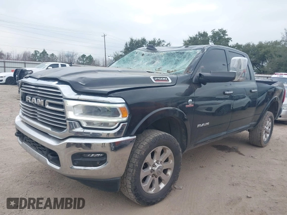 2020 Ram 2500 Laramie z VIN 3C6UR5FL6LG284652, wystawiony jako IAAI lot #41536970 z przebiegiem 92 566 mil mil oraz . Historia ofert i sprzedaży dostępna na DreamBid. Obrazek 2.