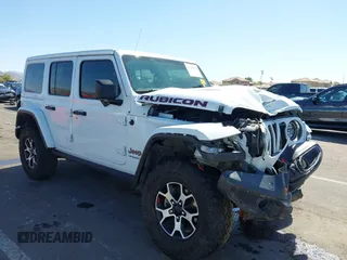 2021 Jeep Wrangler Unlimited Rubicon z VIN 1C4JJXFM5MW517947, wystawiony jako IAAI lot #42298270 z przebiegiem 58 695 mil mil oraz . Historia ofert i sprzedaży dostępna na DreamBid. Obrazek 1.