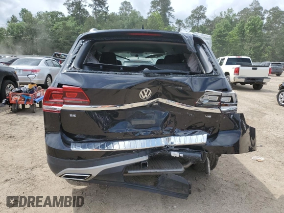 2019 Volkswagen Atlas SE with VIN 1V2DR2CA7KC605849, listed as a Copart auction lot 55557865 with 74,410 mi miles and Salvage title. Bid and sale history available at DreamBid. Image 6.