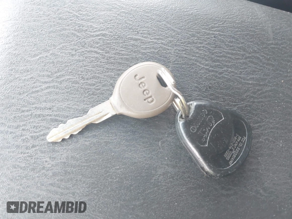 2003 Jeep Grand Cherokee Laredo with VIN 1J4GW48S03C557756, listed as a IAAI auction lot 42507884 with 195,236 mi miles and . Bid and sale history available at DreamBid. Image 11.