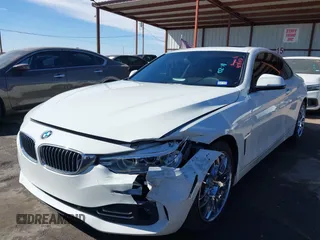 2015 BMW 4 Series 428i with VIN WBA3N3C51FK232902, listed as a IAAI auction lot 41547137 with 136,306 mi miles and . Bid and sale history available at DreamBid. Image 6.