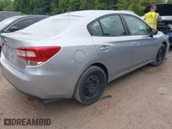 2019 Subaru Impreza with VIN 4S3GKAB60K3608733, listed as a IAAI auction lot 42361729 with 58,863 mi miles and . Bid and sale history available at DreamBid. Image 4.