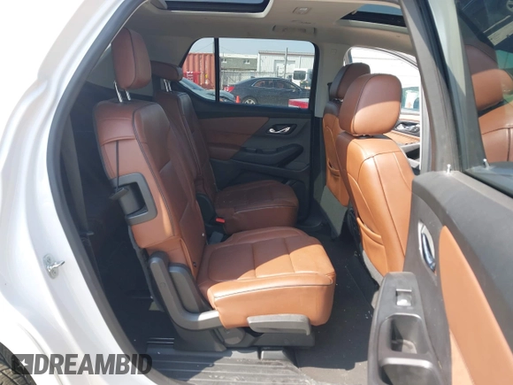 2018 Chevrolet Traverse High Country with VIN 1GNEVKKW9JJ111962, listed as a IAAI auction lot 42118324 with 104,311 mi miles and . Bid and sale history available at DreamBid. Image 8.