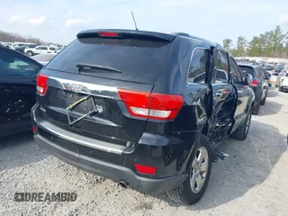 2013 Jeep Grand Cherokee Limited with VIN 1C4RJEBGXDC520609, listed as a IAAI auction lot 41493503 with 173,020 mi miles. Bid and sale history available at carsss.com. Image 4.