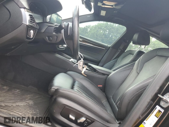 2020 BMW 5 Series with VIN WBAJB1C03LCD19170, listed as a Copart auction lot 64942594 with 66,584 mi miles and Salvage title. Bid and sale history available at DreamBid. Image 7.