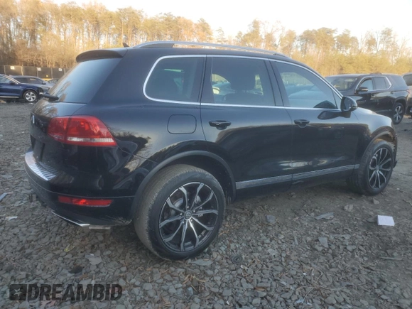 2013 Volkswagen Touareg Lux with VIN WVGEF9BP1DD001025, listed as a Copart auction lot 83784314 with 205,871 mi miles and Salvage Title. Bid and sale history available at DreamBid. Image 3.